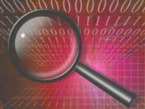 magnifying glass over background of computer code magnifying glass over background of computer code